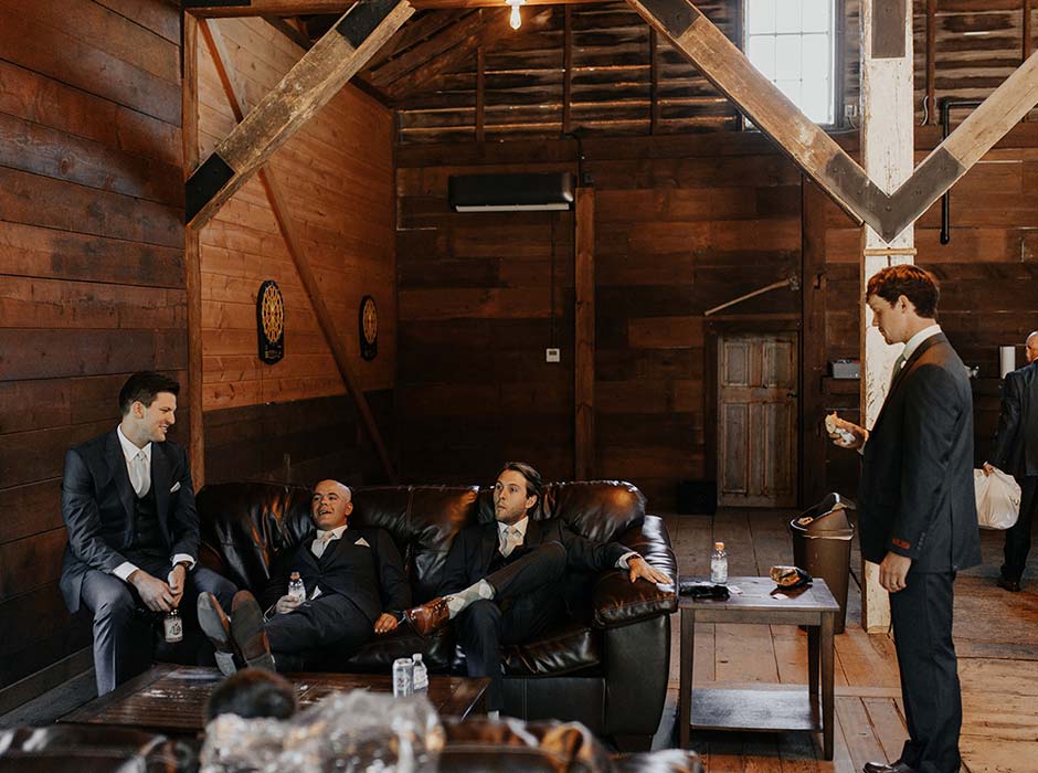 The Den is the perfect event space for the groom and groomsmen to prepare for a wedding at Mayowood Stone Barn in Rochester MN